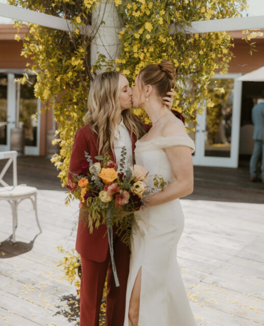 Sonia and Kelsey didn’t walk down an aisle - they walked out onto the deck of their own backyard. It’s the same space tied to their everyday memories, but that night it was wrapped in florals, candlelight, and the people who mattered most. ⁠
⁠
Sonia’s gown was stitched by a family friend, Kelsey chose wine-red separates that matched the mood, and together they built a day that looked nothing like a production and everything like them ⁠
⁠
And honestly? The detail that sticks isn’t the florals or even the tacos (though both were excellent). It’s the jackets. They handed out nearly every coat and blanket they owned when the LA night turned cold, and guests kept dancing anyway. ⁠
⁠
That’s the kind of wedding you never forget.⁠
⁠
The full at-home story is waiting up on the blog - linked up in the usual spot for you 🌈⁠
⁠
Featured in @dancingwithher⁠
Captured by @kelliejanephoto