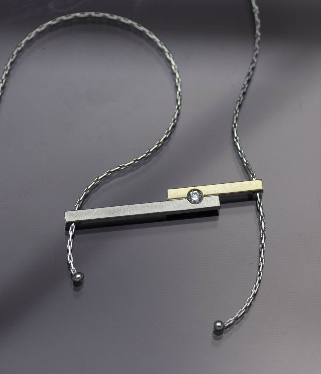 Lolide Seattle USA is a lesbian, gay, queer LGBTQIA+ wedding and engagement jeweler crafting this fused double bar necklace