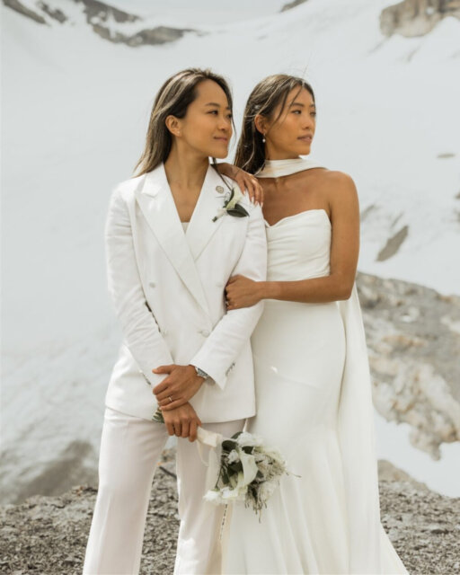 There's a Chinese idiom, “山盟海誓” (shān méng hǎi shì), which translates to "a vow as strong as the mountain and as deep as the sea." For Joanne (she/her) and Joyee (she/her), this became the beautiful, grounding theme of their elopement ❤️⁠
⁠
Their celebration wasn't just a single day, but a three-day adventure filled with love and intention. With family flying in from Hong Kong, the UK, and Denmark, they shared intimate moments that stretched from a stunning lakeside ceremony to cozy BBQ nights in their cabin.⁠
⁠
One of the most memorable parts? A last-minute change of plans due to rainy weather led them to the breathtaking Bow Lake for their ceremony. And to top it all off, they took a helicopter ride over the Rockies for portraits that are nothing short of EPIC. It was a perfect reminder that sometimes the unexpected moments are the most beautiful.⁠
⁠
You'll find this one featured over on our blog, links up in the usual spot for you 👆️⁠
⁠
Featured in @dancingwithher⁠
Lovers @jchings & @joyeelammm⁠
Photography by @willowandwolfweddings⁠
⁠
Caterer @brieandbanquet⁠
Cake @sweetmemoriescakery.ab⁠
Officiant @marriedbycole⁠
Dress Boutique @missbrideweddingshop⁠
Dress Designer @jennyyoonyc⁠
Florist @alphineblooms.ca⁠
Hair & Makeup @juliajoybeautyco⁠
Pants @frey.tailored⁠
Rings @ryderdiamonds⁠
Stationery @slantsandswirls⁠
Venue @banff.national.park & @stixcabin⁠