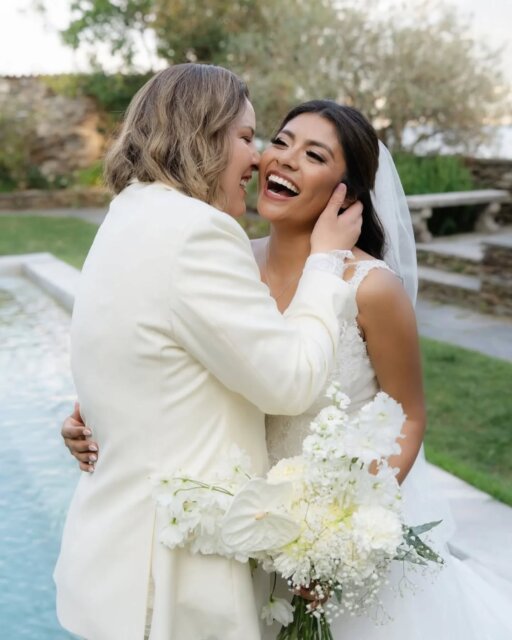 When Dionne (she/her) and Ashley (she/her) started planning their destination wedding, they dreamed of a castle in Tuscany. What they got instead were silence and no's—Italian venues turning them away simply for being a lesbian couple.

Sometimes the door that closes pushes you toward something better.

They found Villa Emden on Brissago Island in Switzerland - a place surrounded by water, gardens, and stillness. A place that said yes without hesitation. Eighteen guests. Lake light. Dusty blue tones against the mountains 🩵

The ceremony had handwritten vows they spent weeks writing and a mariachi band playing.

They walked down the aisle at the same time - Dionne with her mother, Ashley with her best friend - meeting in the middle to start the ceremony together. 

There was also a first dance waltz they stayed up practicing until 2am the night before, both of them determined to get it right!

This wedding was built from resilience, shaped by heartbreak, and grounded in the kind of deep family love that doesn't bend when the world says no. It was so intimate, so intentional, and exactly what they needed.

This one has just been featured over on the blog, linked up in the usual spot for you!

Featured in @dancingwithher
Photography by @sabrina_bartal_photography claudiazenderphotography
Couple @_dionnevargas & @atatypicalashley

Cake @sweetcupcakes.thecakestudio
Dress @cherieamor_official
Florist @miss.deco
Hair & Makeup @nichamakeup & @uniquelysamuela
Rings @tiffanyandco
Suit @suitsupply
Shirt @cherieamor_official
Venue @hotelvillaemden
Videographer @desidero.weddings